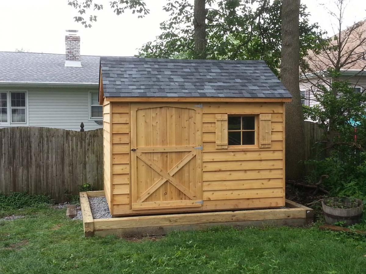 8x10 cedar gable, 48 inch door, 1 window with shutters, pewter gray roof