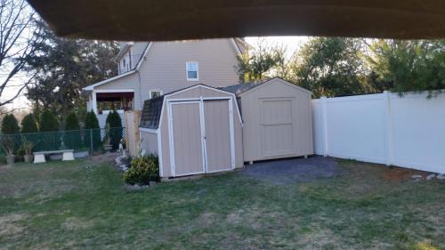 8x12 Utility Shed to replace the old dog next to it